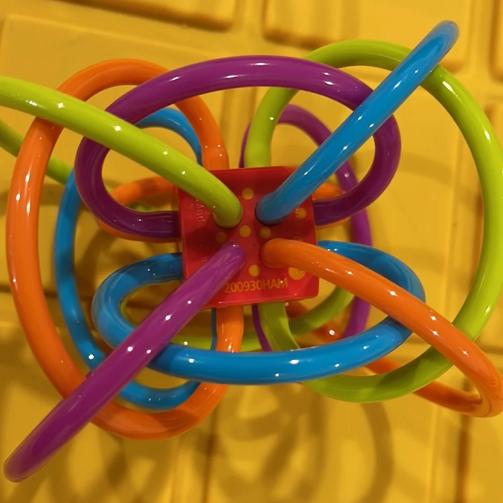 Manhattan toy winkel rattle and sensory teether